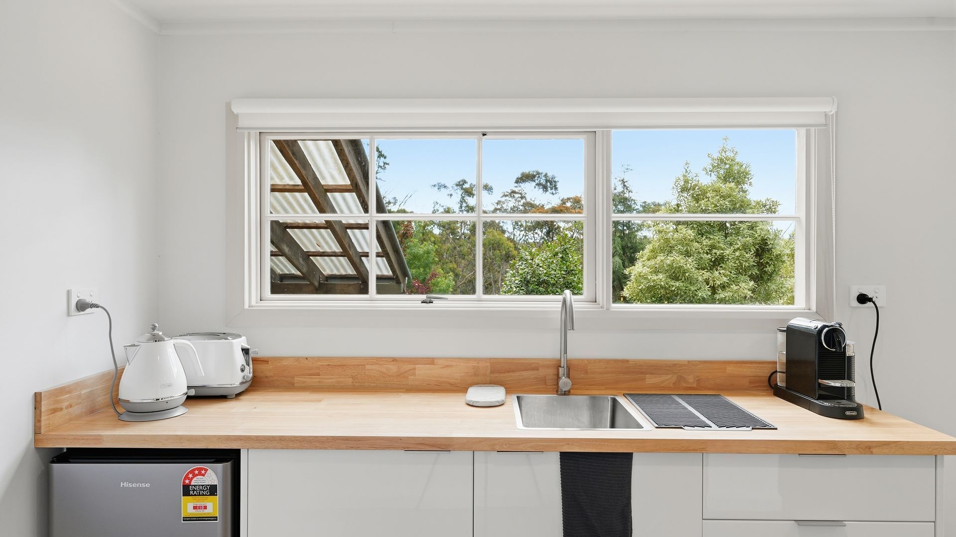 Fridge, microwave, coffee/tea maker, toaster