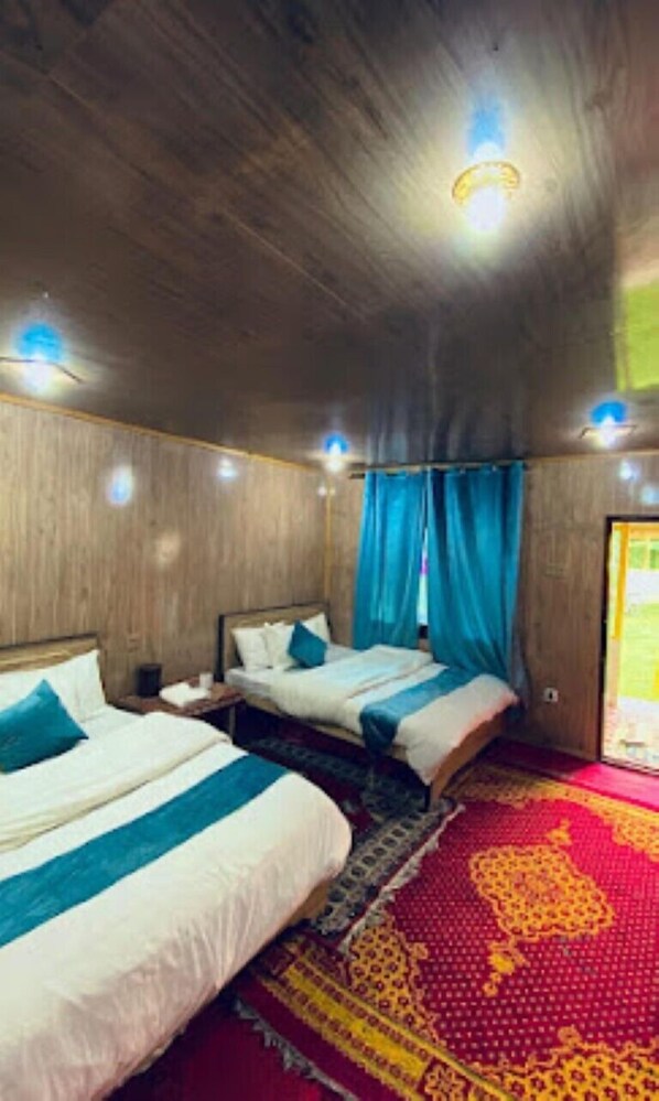 غرفة ديلوكس مزدوجة - منظر للجبل | تجهيزات عازلة لل صوت ومكواة/لوح كي وواي فاي مجانًا