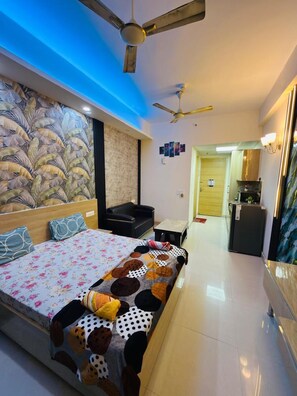 In-room safe, desk, laptop workspace, blackout curtains - NOIDA LUXURY STAYS (Greater Noida)