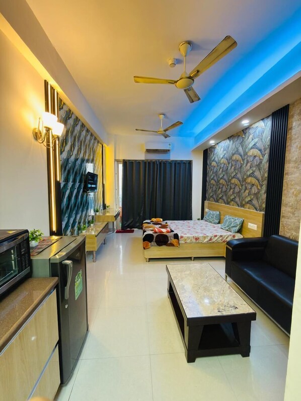 In-room safe, desk, laptop workspace, blackout curtains - NOIDA LUXURY STAYS (Greater Noida)
