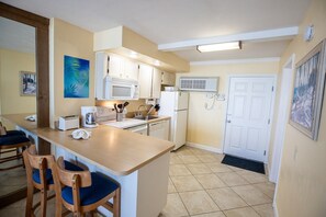Fridge, microwave, oven, stovetop - Oceanfront Studio w/ Balcony in Daytona Beach (Daytona Beach Shores)