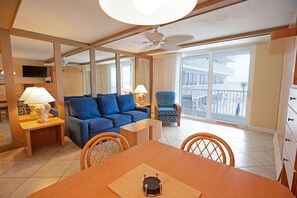 TV, books - 1BR Oceanfront Condo w/ Full Kitchen & Balcony (Daytona Beach Shores)