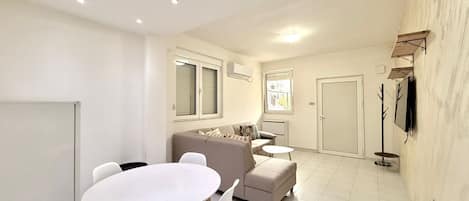 Comfort Apartment, Patio | Living area