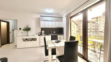 Luxury Apartment, Balcony | Private kitchen | Full-size fridge, stovetop, cookware/dishes/utensils