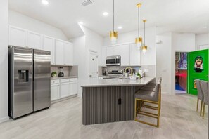 Fridge, microwave, oven, stovetop - Paradiso Grande 5BR Home w Pool, Mario Game Room (Orlando)