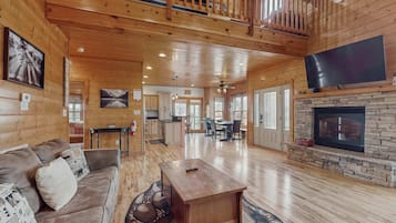 Televisión, chimenea y oficina