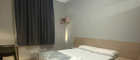 Laptop workspace, free WiFi, bed sheets