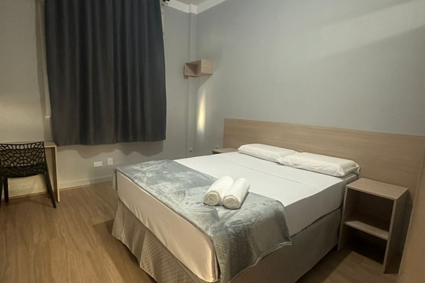 Laptop workspace, free WiFi, bed sheets