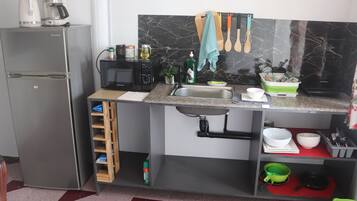 Fridge, coffee/tea maker, dining tables
