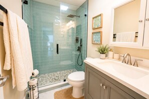 Hair dryer, towels, soap, toilet paper