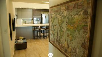 Apartamento luxo, vista para a praia | Comodidades do quarto