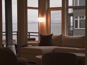 TV, fireplace - Puget Sound Views Elegant 2BR Walk to Pike Place (Seattle)