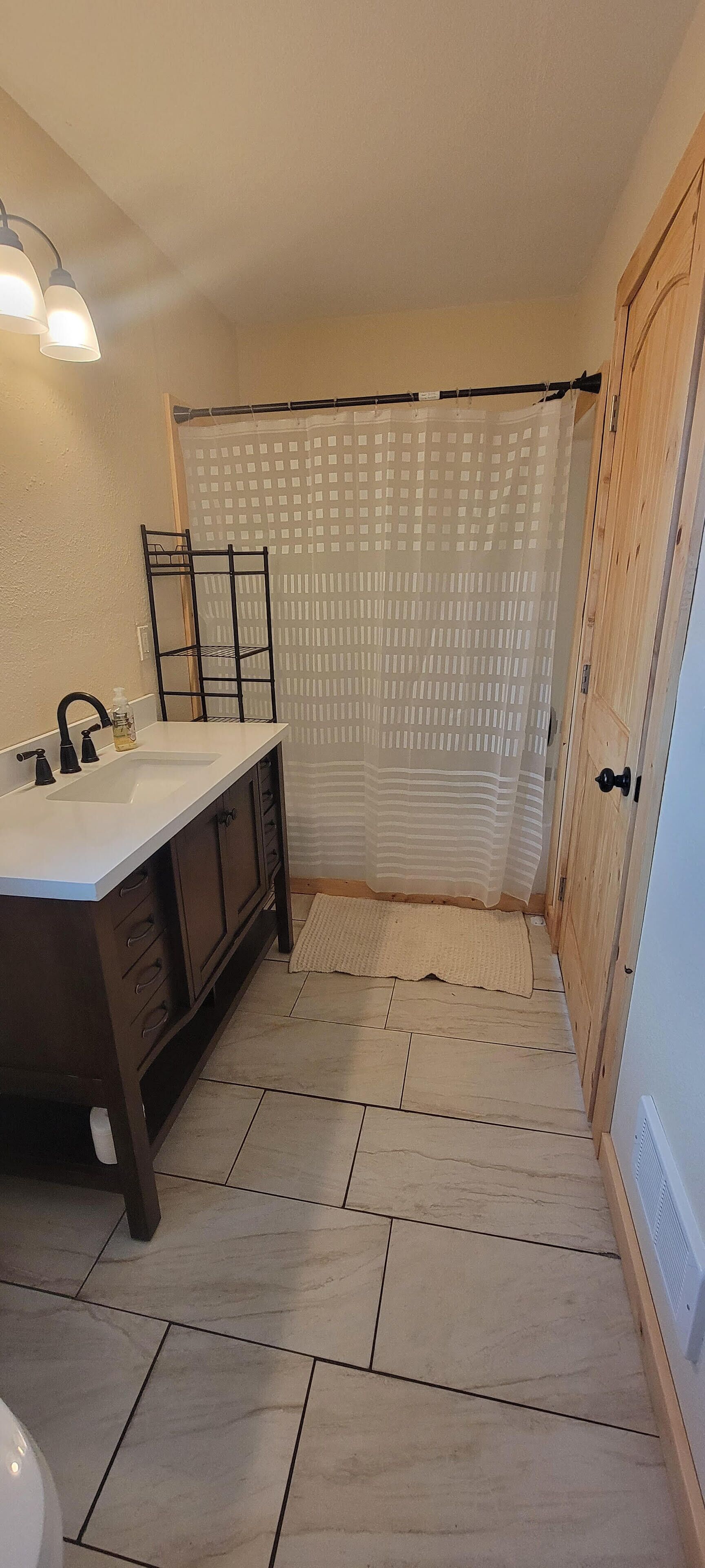 Hair dryer, towels, soap, toilet paper