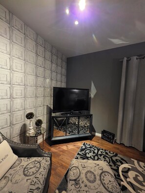 Suite, 1 Queen Bed | Living area - Mjd Place & Executive Suites (West Nipissing)