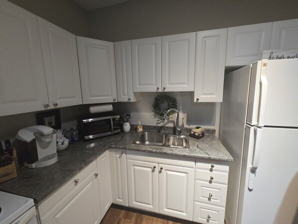 Suite, 2 Bedrooms | Private kitchen - Mjd Place & Executive Suites (West Nipissing)