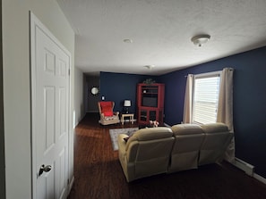Suite, 1 Queen Bed | Living area - Mjd Place & Executive Suites (West Nipissing)