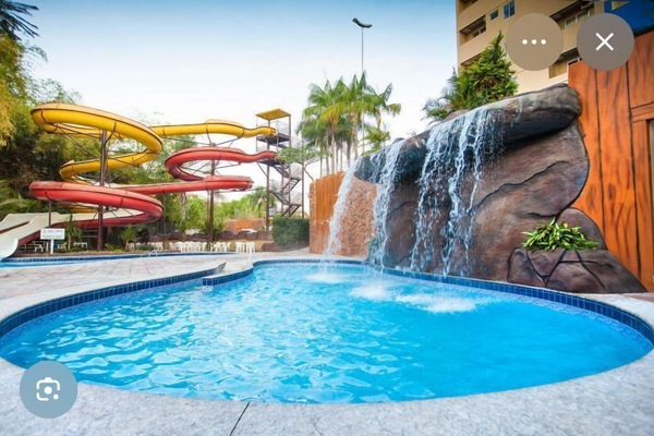 Family Room, Balcony, Pool View | Natural pool | 9 outdoor pools