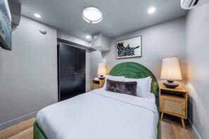 1 chambre, fer et planche à repasser, accès au Wi-Fi (inclus)