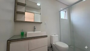 Shower, towels, toilet paper