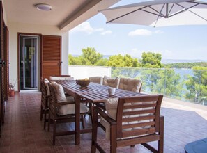 Outdoor dining - Three Bedroom Holiday Home With Balcony and Sea View (Jelsa)
