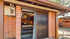 A room with a bed, a ceiling fan, and a window. - Pool & Patio! 'Bike Haüs' By Catalina Mtn Trails (Tucson)