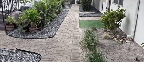 Suite, Patio | Property grounds