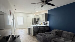 Suite, terrasse | Oppholdsområde