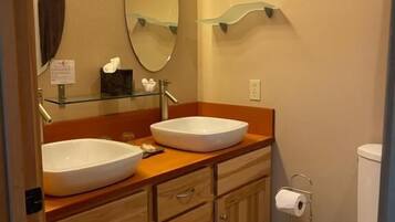 Suite, 1 Queen Bed, River View | Bathroom | Bathrobes, slippers, towels