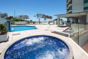 Outdoor pool, a heated pool - 2 Bedroom (1 King & 1 Bunk Bed) Ocean View apartment (Main Beach)