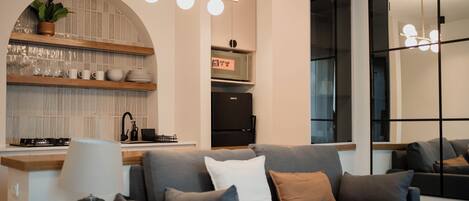 Luxury Studio Suite, Patio, Courtyard View | Living area | 40-inch Smart TV with digital channels