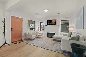 TV, fireplace - Chic Bungalow | A Modern Stay (Spokane)