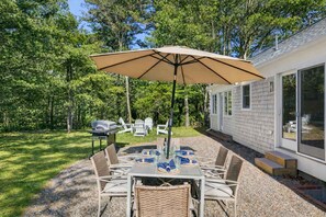 Outdoor dining - Charming Retreat with AC, Fire Pit, Game Room! (Orleans)