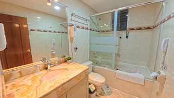 Hair dryer, towels, soap, shampoo