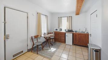 Fridge, microwave, stovetop, coffee/tea maker