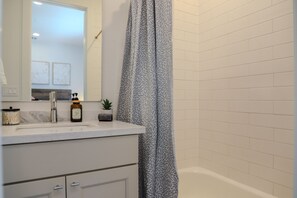 Hair dryer, towels, soap, shampoo