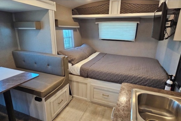 Spacious comfortable, living area filled with natural light.