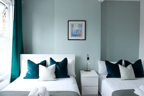 Suite exclusiva, amb bany privat, vistes a la ciutat (Quad (4-Person)) | Wifi gratuïta 