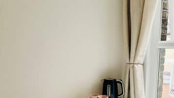 Premium tweepersoonskamer, gemeenschappelijke badkamer | Gratis wifi