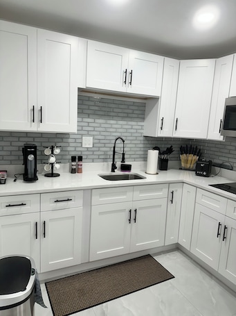 Private kitchen. Villa Caru - Quiet Retreat Near Beaches and Beachfront Restaurants