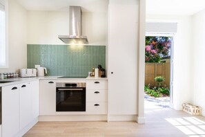 Fridge, microwave, oven, stovetop - Sydenham 2BR | New Build, Parking, Games Room (Christchurch)