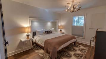 Tabla de planchar con plancha, wifi y ropa de cama