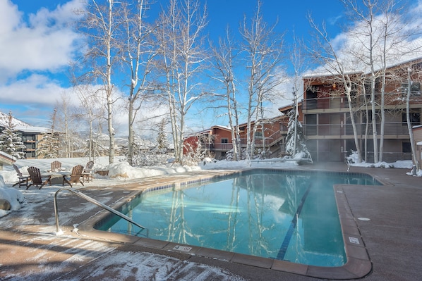 A heated pool - Enclave 313 | Ski-In/Ski-Out Condo w/Shared Pool/Hot Tub/Gym/WiFi (Snowmass Village)