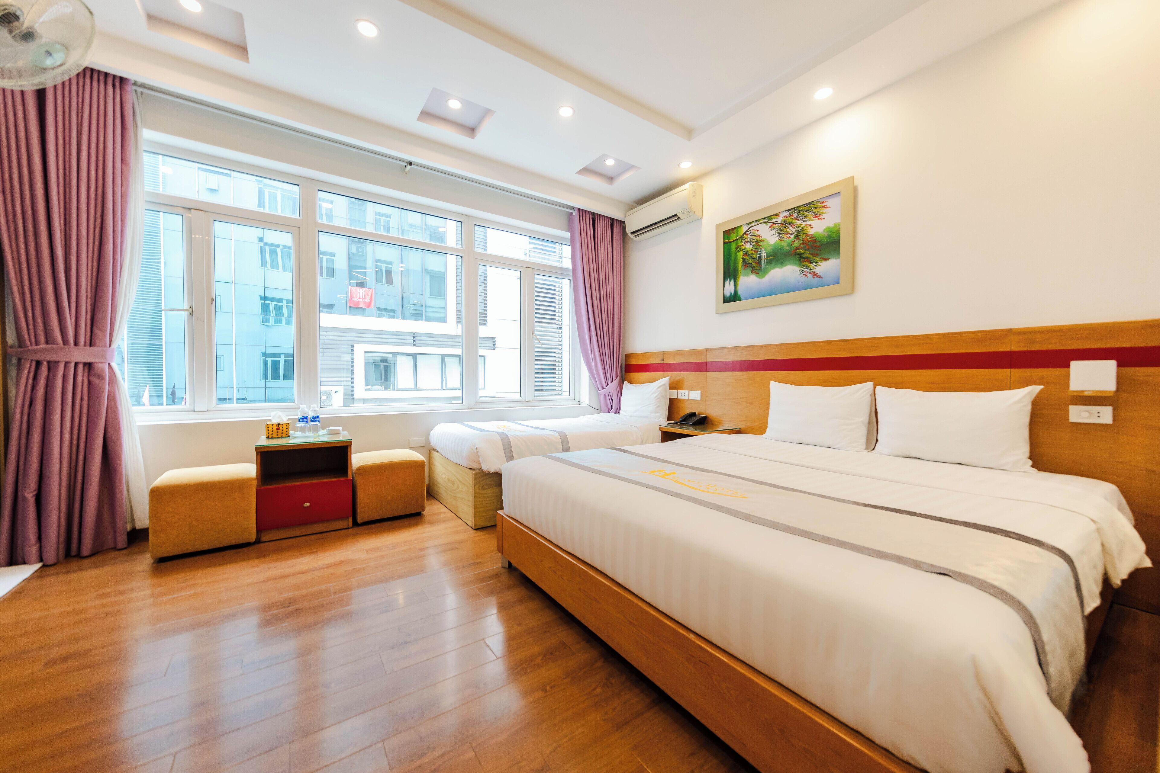 Habitación triple Deluxe, vista a la ciudad | Wifi gratis 