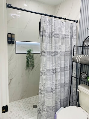 Hair dryer, towels, soap, shampoo