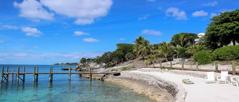 On the beach, sun-loungers, beach towels