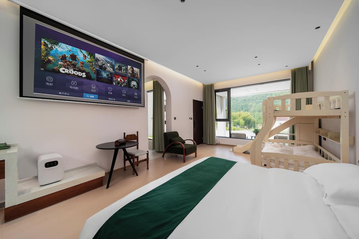 Premium bedding, desk, laptop workspace, blackout curtains