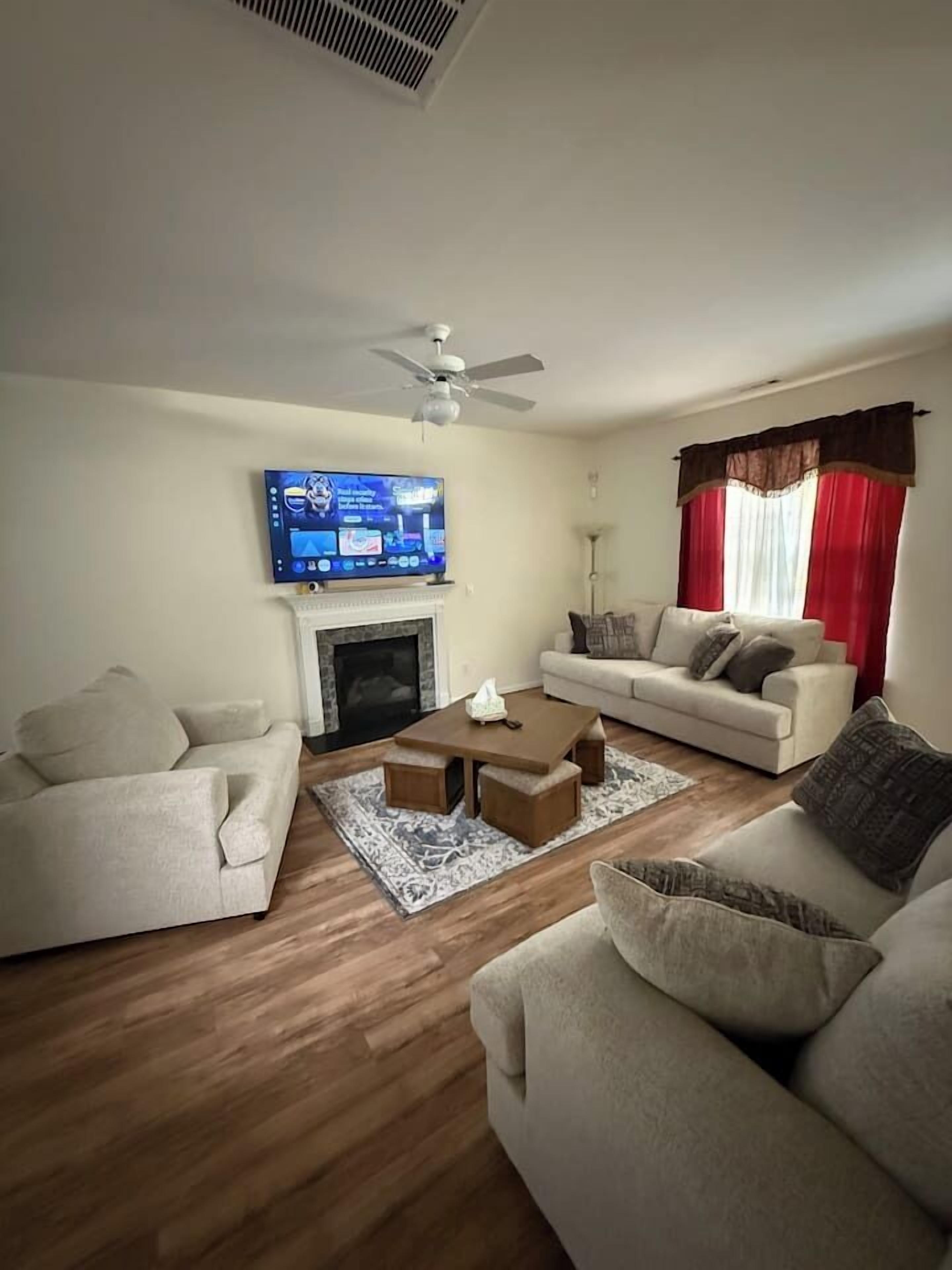 Smart TV, fireplace, books