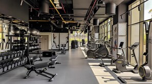Fitness facility - Burj Khalifa & Canal View Stylish 2BR Apartment (Dubai)