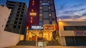 A multi-story building with a prominent 'Bonsal's Arcade' sign. - Fabhotel Casa Grand Himayathnagar (Hyderabad)