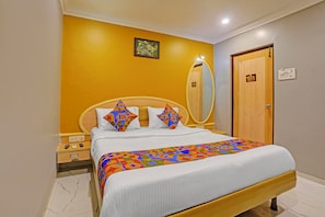 ห้องดีลักซ์ | ผ้าปูที่นอนฝ้ายอียิปต์, เครื่องนอนระดับพรีเมียม, ตู้นิรภัยในห้องพัก